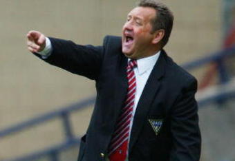 GLASGOW, SCOTLAND - APRIL 10:  Manager Jimmy Calderwood of Dunfermline shouts at his players during the Tennents Scottish FA Cup Semi Final match between Inverness Caledonian Thistle and Dunfermline Athletic at Hampden Park on April 10, 2004 in Glasgow, Scotland.  (Photo by Christopher Lee/Getty Images)