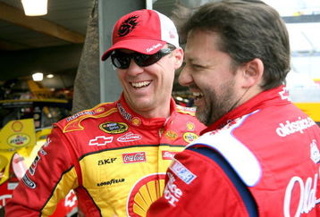 MARTINSVILLE, VA - MARCH 27:  Tony Stewart (R), driver of the #20 Old Spice/Office Depot Chevrolet, greets Kevin Harvick (L), driver of the #29 Shell/Pennzoil Chevrolet, during practice for the NASCAR Sprint Cup Series Goody�s Fast Pain Relief 500 at the Martinsville Speedway on March 27, 2009 in Martinsville, Virginia.  (Photo by Jerry Markland/Getty Images for NASCAR)