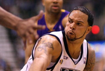 SALT LAKE CITY - APRIL 25:  Deron Williams #8 of the Utah Jazz passes against the Los Angeles Lakers in Game Four of the Western Conference Quarterfinals during the 2009 NBA Playoffs at Energy Solutions Arena on April 25, 2009 in Salt Lake City, Utah. NOTE TO USER: User expressly acknowledges and agrees that, by downloading and/or using this Photograph, user is consenting to the terms and conditions of the Getty Images License Agreement. Mandatory Copyright Notice: Copyright 2009 Getty Images (Photo by Otto Greule Jr/Getty Images)