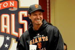 WASHINGTON - JUNE 04:  Randy Johnson #51 of the San Francisco Giants walks into the press conference after winning his 300th career game against the Washington Nationals at Nationals Park on June 4, 2009 in Washington, DC.  The Giants won the game 5-1.  (Photo by Greg Fiume/Getty Images)