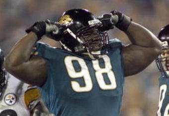JACKSONVILLE, FL - SEPTEMBER 18: John Henderson #98 of the Jacksonville Jaguars celebrates the sacking of Ben Roethlisberger #7 of the Pittsburgh Steelers at Alltel Stadium on September 18, 2006 in Jacksonville, Florida. The Jaguars defeated the Steelers 9-0.  (Photo by Marc Serota/Getty Images)