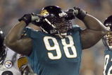 JACKSONVILLE, FL - SEPTEMBER 18: John Henderson #98 of the Jacksonville Jaguars celebrates the sacking of Ben Roethlisberger #7 of the Pittsburgh Steelers at Alltel Stadium on September 18, 2006 in Jacksonville, Florida. The Jaguars defeated the Steelers 9-0.  (Photo by Marc Serota/Getty Images)