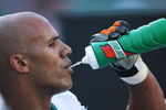 MIAMI - DECEMBER 2:  Jason Taylor #99 of the Miami Dolphins take a drink during the NFL game against the New York Jets at the Dolphin Stadium on December 2, 2007 in Miami, Florida. (Photo by Doug Benc/Getty Images)