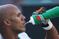 MIAMI - DECEMBER 2: Jason Taylor #99 of the Miami Dolphins take a drink during the NFL game against the New York Jets at the Dolphin Stadium on December 2, 2007 in Miami, Florida. (Photo by Doug Benc/Getty Images)