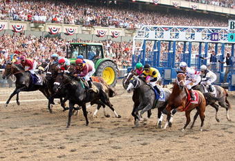 ELMONT, NY - JUNE 07:  Big Brown (R) ridden by jockey Kent Desormeaux and the field come out of the gate to start the 140th running of the Belmont Stakes at Belmont Park on June 7, 2008 in Elmont, New York.  (Photo by Al Bello/Getty Images)