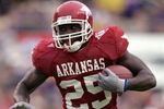 BATON ROUGE, LA - NOVEMBER 25:  Felix Jones #25 of the University of Arkansas Razorbacks carries the ball during the game with the Louisiana State University Tigers on November 25, 2005 at Tiger Stadium in Baton Rouge, Louisiana.  The Tigers won 19-17.  (Photo by Chris Graythen/Getty Images) 