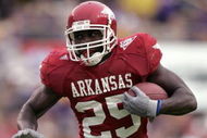 BATON ROUGE, LA - NOVEMBER 25: Felix Jones #25 of the University of Arkansas Razorbacks carries the ball during the game with the Louisiana State University Tigers on November 25, 2005 at Tiger Stadium in Baton Rouge, Louisiana. The Tigers won 19-17. (Photo by Chris Graythen/Getty Images)