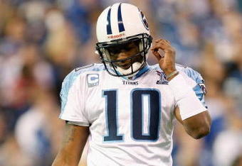 INDIANAPOLIS - DECEMBER 28:  Quarterback Vince Young #10 of the Tennessee Titans walk off the field during the game against the Indianapolis Colts on December 28, 2008 at Lucas Oil Stadium in Indianapolis, Indiana. (Photo by: Jamie Squire/Getty Images)