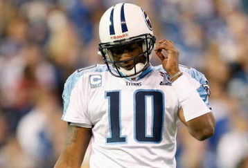INDIANAPOLIS - DECEMBER 28:  Quarterback Vince Young #10 of the Tennessee Titans walk off the field during the game against the Indianapolis Colts on December 28, 2008 at Lucas Oil Stadium in Indianapolis, Indiana. (Photo by: Jamie Squire/Getty Images)