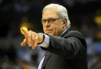 DENVER - MAY 23:  Head coach Phil Jackson of the Los Angeles Lakers points in the second half against the Denver Nuggets in Game Three of the Western Conference Finals during the 2009 NBA Playoffs at Staples Center on May 23, 2009 in Denver, Colorado. NOTE TO USER: User expressly acknowledges and agrees that, by downloading and or using this photograph, User is consenting to the terms and conditions of the Getty Images License Agreement.  (Photo by Doug Pensinger/Getty Images)