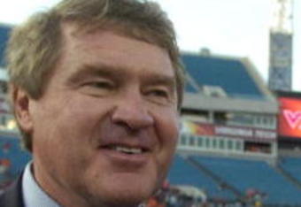 JACKSONVILLE, FL - DECEMBER 1: ACC Commissioner John Swofford and coach Frank Beamer of the Virginia Tech Hokies meet after play against the Boston College Eagles in the ACC Championship Game at Jacksonville Municipal Stadium on December 1, 2007 in Jacksonville, Florida.  The Hokies won the title 30 - 16.  (Photo by Al Messerschmidt/Getty Images)