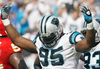 CHARLOTTE, NC - OCTOBER 05:  Charles Johnson #95 of the Carolina Panthers celebrates on the field during the game against the Kansas City Chiefs at Bank of America on October 5, 2008 in Charlotte, North Carolina.  (Photo by Kevin C. Cox/Getty Images)