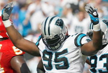 CHARLOTTE, NC - OCTOBER 05:  Charles Johnson #95 of the Carolina Panthers celebrates on the field during the game against the Kansas City Chiefs at Bank of America on October 5, 2008 in Charlotte, North Carolina.  (Photo by Kevin C. Cox/Getty Images)