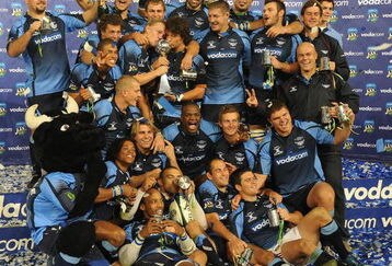 PRETORIA, SOUTH AFRICA - MAY 30: Bulls players celebrate victory after the Super 14 final match between Vodacom Bulls and Chiefs at Loftus Versfeld Stadium on May 30, 2009 in Pretoria, South Africa. (Photo by Lefty Shivambu/Gallo Images/Getty Images)