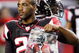 ATLANTA - DECEMBER 10:  DeAngelo Hall #21 of the Atlanta Falcons holds up a poster of Michael Vick during player intros against the New Orleans Saints on December 10, 2007 at the Georgia Dome in Atlanta, Georgia.  (Photo by Chris Graythen/Getty Images)