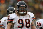 GREEN BAY, WI - NOVEMBER 16:  Defensive tackle Dusty Dvoracek #98 of the Chicago Bears awaits action at the line of scrimmage as he defends against the Green Bay Packers during NFL action at Lambeau Field on November 16, 2008 in Green Bay, Wisconsin. The Packers defeated the Bears 37-3.  (Photo by Doug Pensinger/Getty Images)