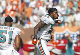 MIAMI - JANUARY 4:  Joey Porter #55 of the Miami Dolphins gestures before a AFC Wild Card playoff game against the Baltimore Ravens on January 4, 2009 at Dolphin Stadium in Miami, Florida. (Photo by Gregory Shamus/Getty Images)