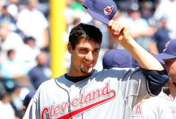 NEW YORK - APRIL 16:  Carl Pavano #44 of the Cleveland Indians tips his hat during player introductions before the opening day game against the New York Yankees at the new Yankee Stadium on April 16, 2009 in the Bronx borough of New York City. This is the first regular season MLB game being played at the new venue which replaced the old Yankee Stadium as the Yankees home field.  (Photo by Jim McIsaac/Getty Images)
