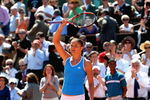 PARIS - JUNE 04:  Dinara Safina of Russia waves to the crowd following her victory during the Women's Singles Semi Final match against Dominika Cibulkova of Slovakia on day Twelve of the French Open at Roland Garros on June 4, 2009 in Paris, France.  (Photo by Clive Brunskill/Getty Images)