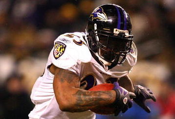 PITTSBURGH - JANUARY 18:  Willis McGahee #23 of the Baltimore Ravens scores a 1-yard rushing touchdown in the fourth quarter against Larry Foote #50 of the Pittsburgh Steelers during the AFC Championship game on January 18, 2009 at Heinz Field in Pittsburgh, Pennsylvania.  (Photo by Al Bello/Getty Images)