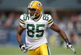 SEATTLE - OCTOBER 12:  Greg Jennings #85 of the Green Bay Packers runs downfield during the game against the Seattle Seahawks on October 12, 2008 at Qwest Field in Seattle, Washington. The Packers defeated the Seahawks 27-17. (Photo by Otto Greule Jr./Getty Images)