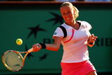 PARIS - JUNE 04:  Svetlana Kuznetsova of Russia hits a forehand during the Women's Singles Semi Final match against Samantha Stosur of Australia on day Twelve of the French Open at Roland Garros on June 4, 2009 in Paris, France.  (Photo by Clive Brunskill/Getty Images)