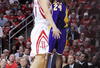 HOUSTON - MAY 08:  Guard Kobe Bryant #24 of the Los Angeles Lakers takes a shot against Yao Ming of the Houston Rockets in Game Three of the Western Conference Semifinals during the 2009 NBA Playoffs at Toyota Center on May 8, 2009 in Houston, Texas. NOTE TO USER: User expressly acknowledges and agrees that, by downloading and or using this photograph, User is consenting to the terms and conditions of the Getty Images License Agreement.  (Photo by Ronald Martinez/Getty Images)