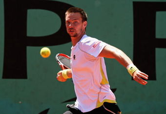 PARIS - JUNE 02:  Robin Soderling of Sweden hits a forehand during the Men's Singles Quarter Final match against Nikolay Davydenko of Russia on day ten of the French Open at Roland Garros on June 2, 2009 in Paris, France.  (Photo by Matthew Stockman/Getty Images)