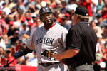 ANAHEIM, CA - MAY 14:  David Ortiz #34 of the Boston Red Sox complains to home plate umpire Bill Miller after bieng called out on strikes in the sixth inning of the game with the Los Angeles Angels of Anaheim on May 14, 2009 at Angel Stadium in Anaheim, California.  The Angels won 5-4 in 12 innings.  (Photo by Stephen Dunn/Getty Images)