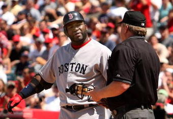ANAHEIM, CA - MAY 14:  David Ortiz #34 of the Boston Red Sox complains to home plate umpire Bill Miller after bieng called out on strikes in the sixth inning of the game with the Los Angeles Angels of Anaheim on May 14, 2009 at Angel Stadium in Anaheim, California.  The Angels won 5-4 in 12 innings.  (Photo by Stephen Dunn/Getty Images)
