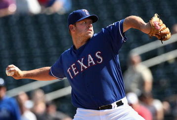 SURPRISE, AZ - MARCH 04: Starting pitcher Kevin Millwood #33 of the Texas Rangers pitches against the Kansas City Royals during the spring training game at Surprise Stadium on March 4, 2009 in Surprise, Arizona.  (Photo by Christian Petersen/Getty Images)