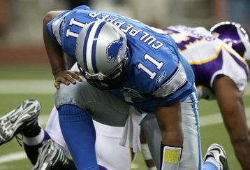 DETROIT - DECEMBER 07:  Quarterback Daunte Culpepper #11 of the Detroit Lions picks himself up against the Minnesoa Vikings during the NFL game at Ford Field on December 7, 2008 in Detroit, Michigan.  The Vikings defeated the Lions 20-16.  (Photo by Christian Petersen/Getty Images)