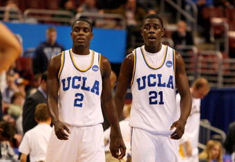 PHILADELPHIA - MARCH 19:  (L-R) Darren Collison #2 and Jrue Holiday #21 of the UCLA Bruins look on during the game against the VCU Rams during the first round of the NCAA Division I Men's Basketball Tournament at the Wachovia Center on March 19, 2009 in Philadelphia, Pennsylvania.  The Bruins defeated the Rams 65-64.  (Photo by Jim McIsaac/Getty Images)
