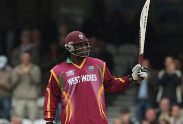 LONDON, ENGLAND - JUNE 06:  Chris Gayle of West Indies reaches 50 during the ICC Twenty20 World Cup match between Australia and West Indies at The Brit Oval on June 6, 2009 in London, England.  (Photo by Hamish Blair/Getty Images)