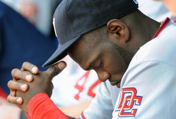 ATLANTA - APRIL 12: Outfielder Elijah Dukes #34 of the Washington Nationals ponders three loses against the Atlanta Braves April 12, 2009 at Turner Field in Atlanta, Georgia.  (Photo by Al Messerschmidt/Getty Images)