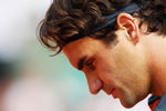 PARIS - JUNE 05:  Roger Federer of Switzerland gathers his thoughts during the Men's Singles Semi Final match against Juan Martin Del Potro of Argentina on day thirteen of the French Open at Roland Garros on June 5, 2009 in Paris, France.  (Photo by Clive Brunskill/Getty Images)