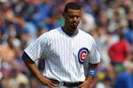 CHICAGO - MAY 29: Derrek Lee #25 of the Chicago Cubs waits for his hat and glove after grounding out against the Los Angeles Dodgers on May 29, 2009 at Wrigley Field in Chicago, Illinois. The Cubs defeated the Dodgers 2-1. (Photo by Jonathan Daniel/Getty Images)