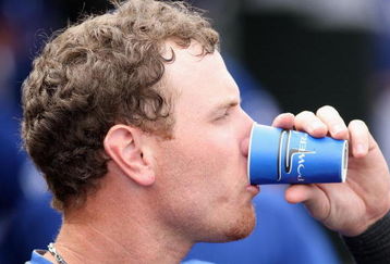 SURPRISE, AZ - MARCH 05:  Josh Hamilton of the Texas Rangers drinks froma powerade cup during the spring training game against the San Diego Padres at Surprise Stadium on March 5, 2009 in Surprise, Arizona. The Rangers defeated the Padres 4-3.  (Photo by Christian Petersen/Getty Images)
