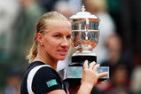 PARIS - JUNE 06:  Svetlana Kuznetsova of Russia poses with the trophy following her victory during the Women's Singles Final match against Dinara Safina of Russia on day fourteen of the French Open at Roland Garros on June 6, 2009 in Paris, France.  (Photo by Ryan Pierse/Getty Images)
