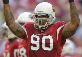 GLENDALE, AZ - DECEMBER 23: Darnell Dockett #90 of the Arizona Cardinals calls on the fans for noise against the Atlanta Falcons during the first quarter at University of Phoenix Stadium on December 23, 2007 in Glendale, Arizona. The Cardinals won 30-27 in overtime.  (Photo by Harry How/Getty Images)