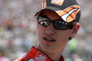 DOVER, DE - MAY 31:  Joey Logano, driver of the #20 Home Depot Toyota, stands on the grid prior to the start of the NASCAR Sprint Cup Series Autism Speaks 400 at Dover International Speedway on May 31, 2009 in Dover, Delaware.  (Photo by Jerry Markland/Getty Images for NASCAR)