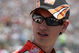 DOVER, DE - MAY 31:  Joey Logano, driver of the #20 Home Depot Toyota, stands on the grid prior to the start of the NASCAR Sprint Cup Series Autism Speaks 400 at Dover International Speedway on May 31, 2009 in Dover, Delaware.  (Photo by Jerry Markland/Getty Images for NASCAR)