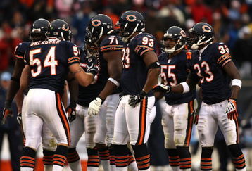 CHICAGO - NOVEMBER 09:  Brian Urlacher #54 of the Chicago Bears stands in the huddle with the defense against the Tennessee Titans at Soldier Field on November 9, 2008 in Chicago, Illinois.  (Photo by Jonathan Ferrey/Getty Images)