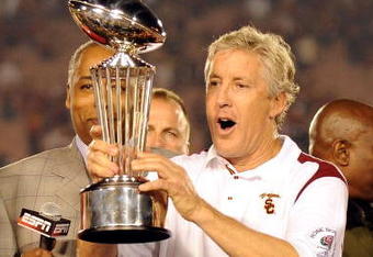 PASADENA, CA - JANUARY 01:  Head coach Pete Carroll of the USC Trojans celebrates with the trophy after defeating the Penn State Nittany Lions at the 95th Rose Bowl Game presented by Citi on January 1, 2009 at the Rose Bowl in Pasadena, California.  (Photo by Harry How/Getty Images)