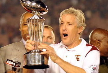 PASADENA, CA - JANUARY 01:  Head coach Pete Carroll of the USC Trojans celebrates with the trophy after defeating the Penn State Nittany Lions at the 95th Rose Bowl Game presented by Citi on January 1, 2009 at the Rose Bowl in Pasadena, California.  (Photo by Harry How/Getty Images)