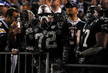 SAN DIEGO - DECEMBER 04:  Oakland Raiders fans look on during the NFL Game against the San Diego Chargers on December 4, 2008 at Qualcomm Stadium in San Diego, California.  (Photo by Harry How/Getty Images)