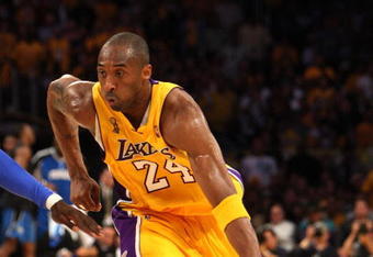 LOS ANGELES, CA - JUNE 04:  Kobe Bryant #24 of the Los Angeles Lakers drives against the Orlando Magic in Game One of the 2009 NBA Finals at Staples Center on June 4, 2009 in Los Angeles, California. NOTE TO USER: User expressly acknowledges and agrees that, by downloading and or using this photograph, User is consenting to the terms and conditions of the Getty Images License Agreement.  (Photo by Jed Jacobsohn/Getty Images)