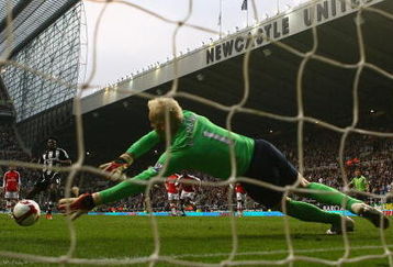 NEWCASTLE, UNITED KINGDOM - MARCH 21:  Obafemi Martins of Newcastle United takes a penalty kick, which was saved by Manuel Almunia of Arsenal during the Barclays Premier League match between Newcastle United and Arsenal at St James' Park on March 21, 2009 in Newcastle, England.  (Photo by Julian Finney/Getty Images)