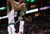 BOSTON - FEBRUARY 08:  Manu Ginobili #20 of San Antonio Spurs goes up for two as Kendrick Perkins  #43 of the Boston Celtics on February 8, 2009 at TD Banknorth Garden in Boston, Massachusetts. The Spurs defeated the Celtics 105-99. NOTE TO USER: User expressly acknowledges and agrees that, by downloading and or using this Photograph, user is consenting to the terms and conditions of the Getty Images License Agreement.  (Photo by Elsa/Getty Images)