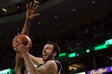 BOSTON - FEBRUARY 08:  Manu Ginobili #20 of San Antonio Spurs goes up for two as Kendrick Perkins  #43 of the Boston Celtics on February 8, 2009 at TD Banknorth Garden in Boston, Massachusetts. The Spurs defeated the Celtics 105-99. NOTE TO USER: User expressly acknowledges and agrees that, by downloading and or using this Photograph, user is consenting to the terms and conditions of the Getty Images License Agreement.  (Photo by Elsa/Getty Images)